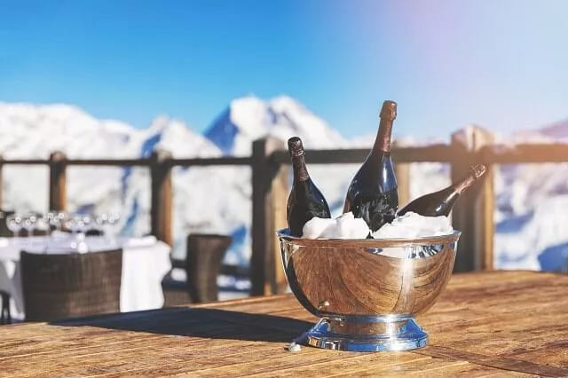 A bottle of champagne at a luxurious ski resort