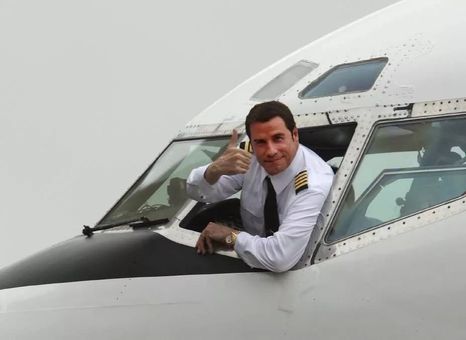 John Travolta piloting his private jet