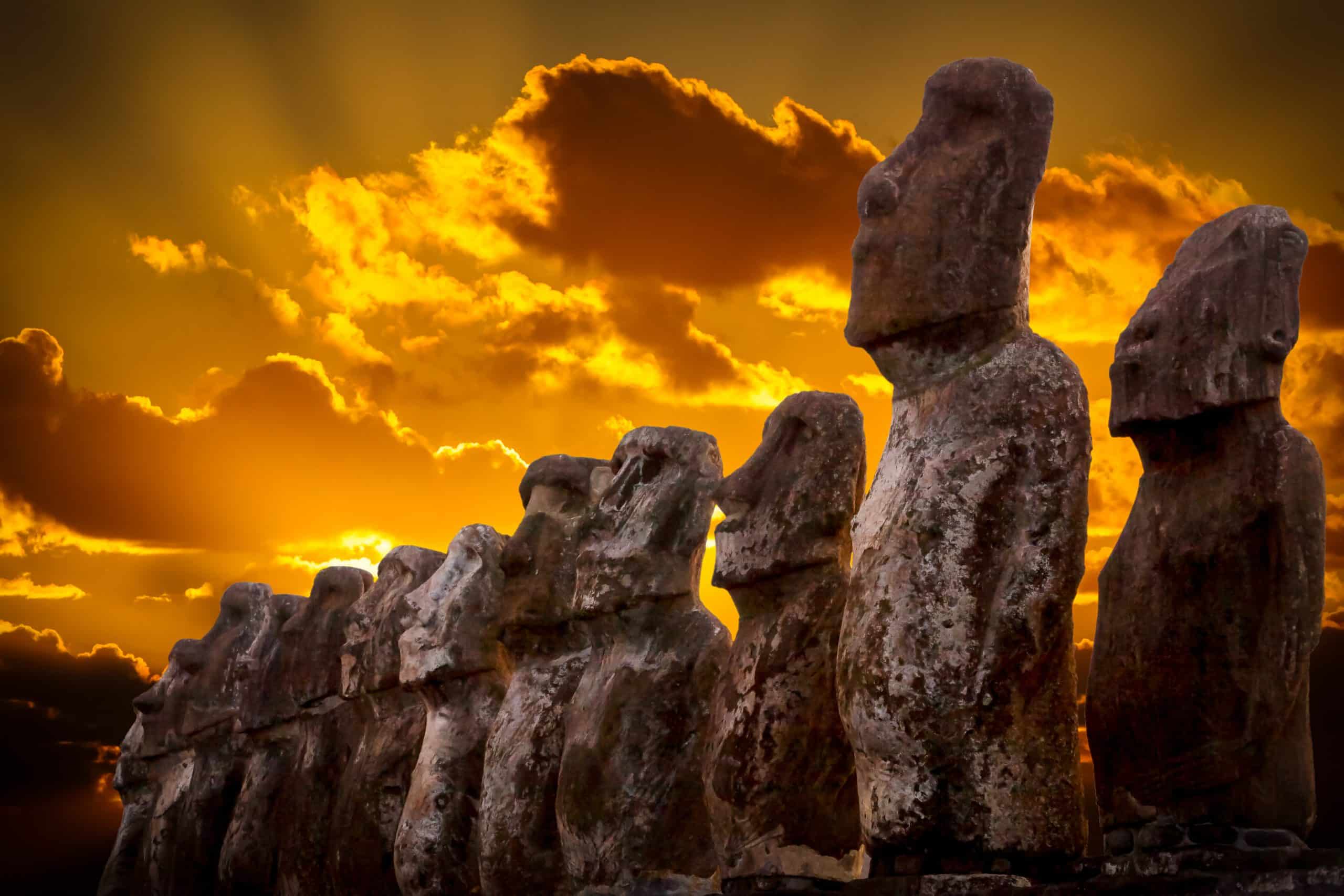 Majestic Moai statues stand in a row on the enigmatic Easter Island, creating a unique and captivating private jet destination for travelers seeking mystery and adventure