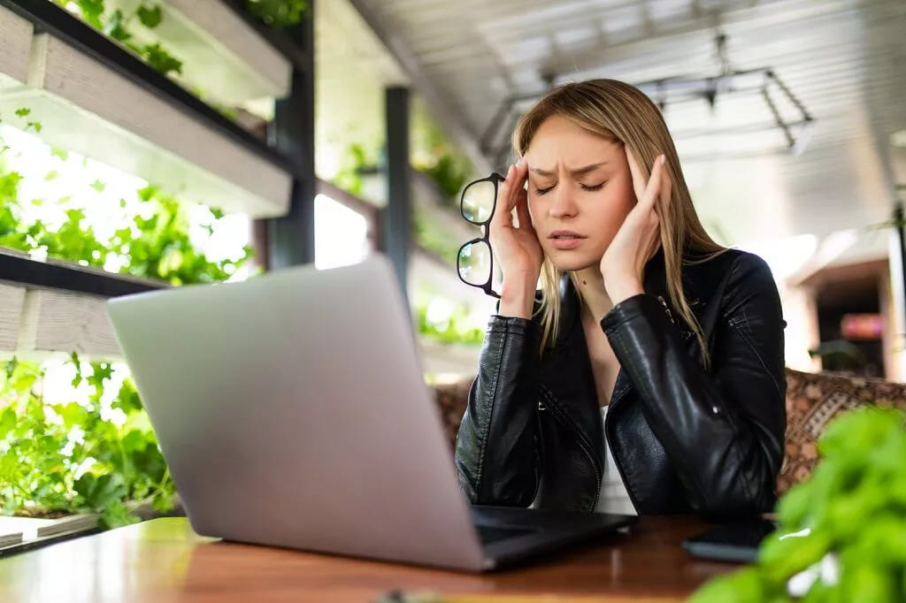 An attractive girl booking a flight online