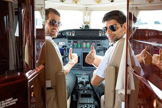 Private Jet Pilots inside cockpit