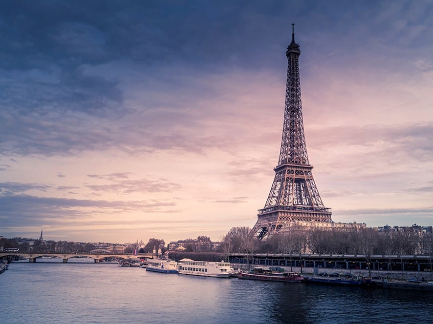 Paris, Eiffel Tower in the Distance Makes for One of the Top 2023 Summer Destinations