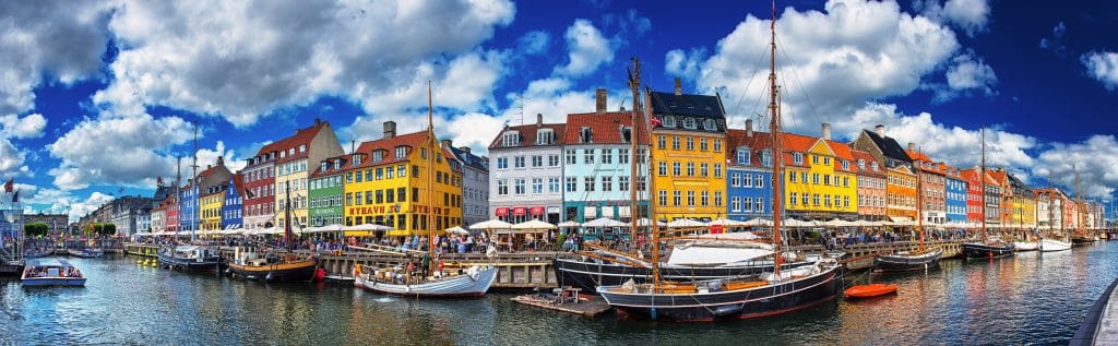 Colorful houses at Nyhavn, Copenhagen, Denmark. Fly Private Jet.