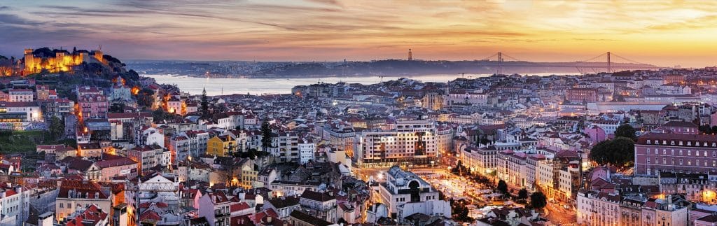 Panorama of Lisbon at night, Portugal. Fly Private to Lisbon.