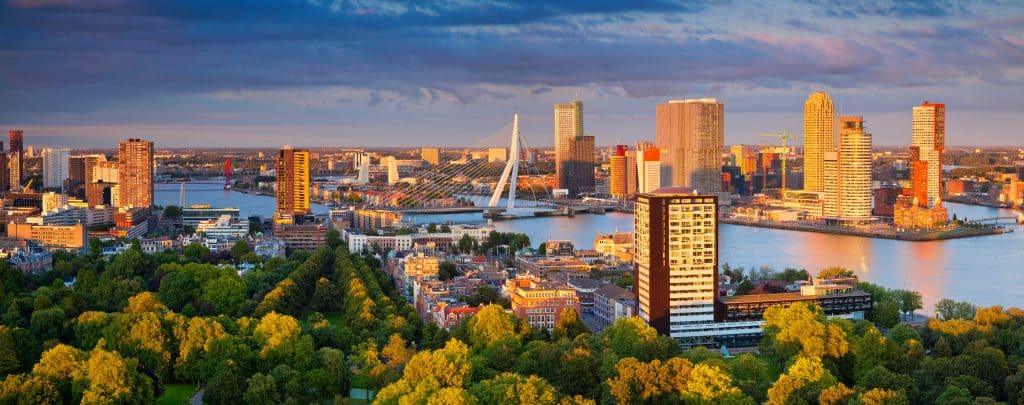 Rotterdam, Netherlands during summer sunset. Fly Private Jet,