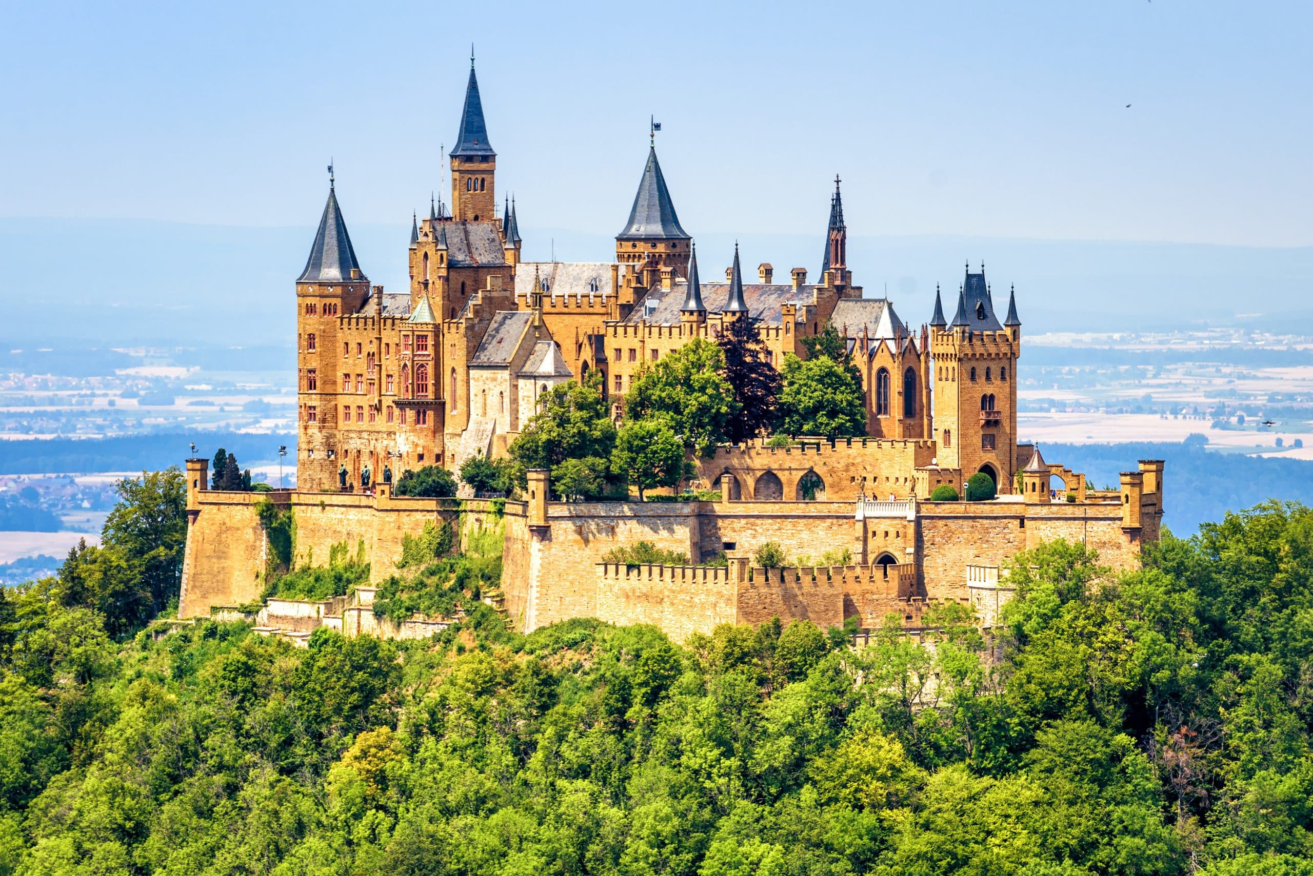 Hohenzollern Castle on mountain top close-up, Germany. Fairytale castle is famous landmark near Stuttgart.