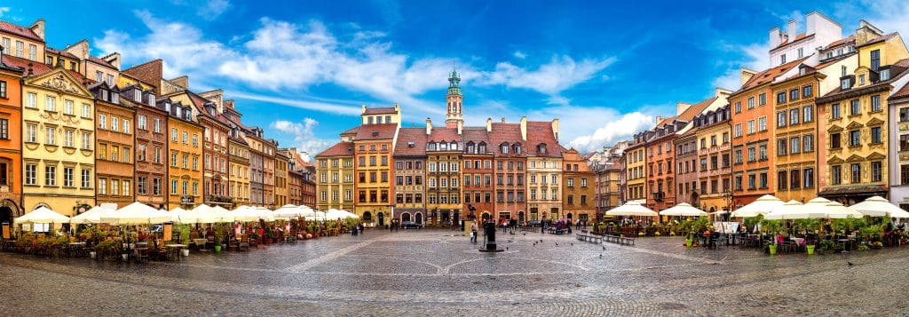 Old town square in Warsaw. Fly Private Jet.