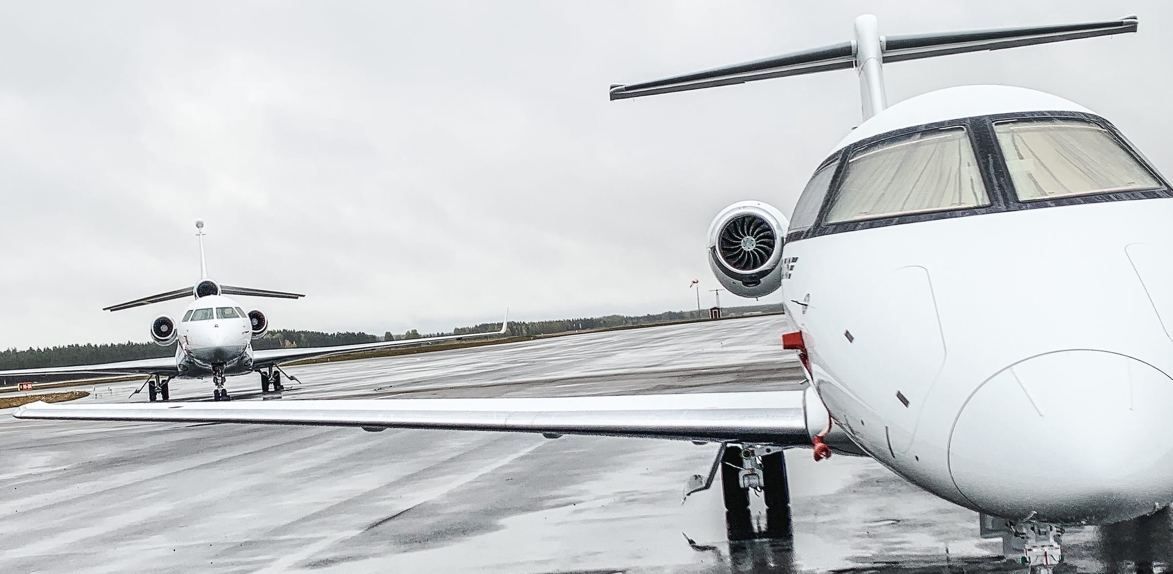 Two Private Jets Parked in the Tarmac