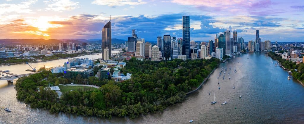 Panorama of Brisbane skyline at sunset. Fly Private to Brisbane