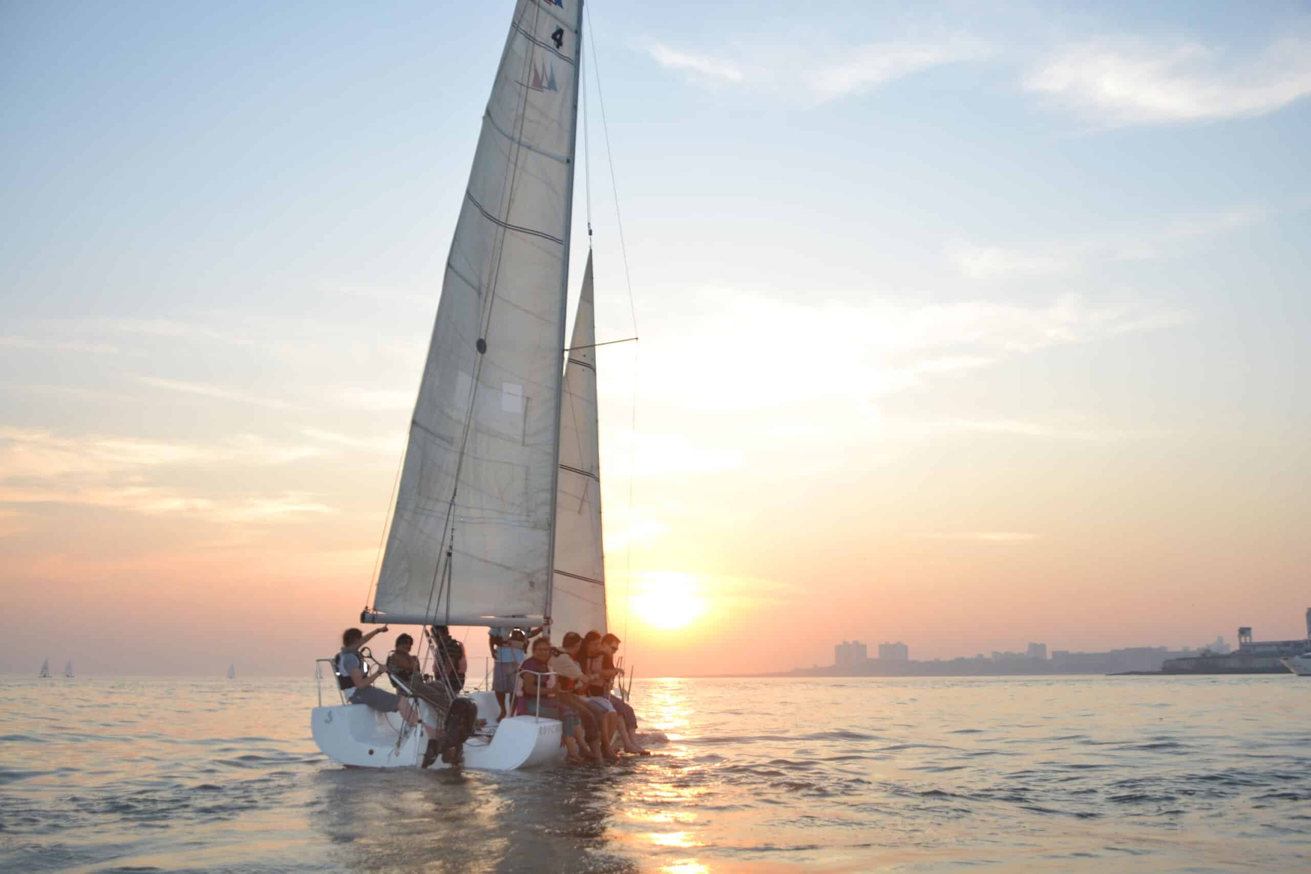 Sailing near the Gateway of India. Fly private to Mumbai.