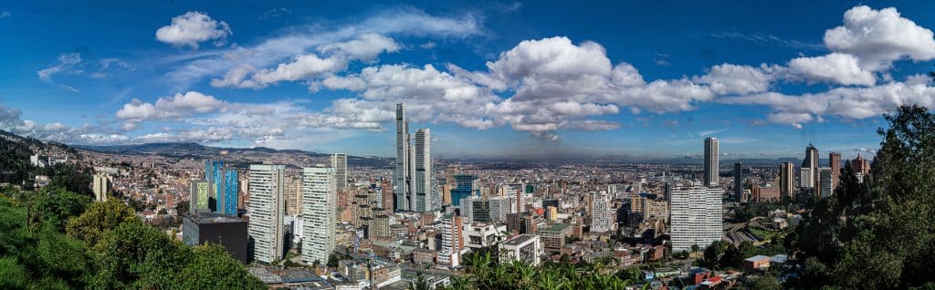 panoramic of city with sky. Fly Private to Bogota.