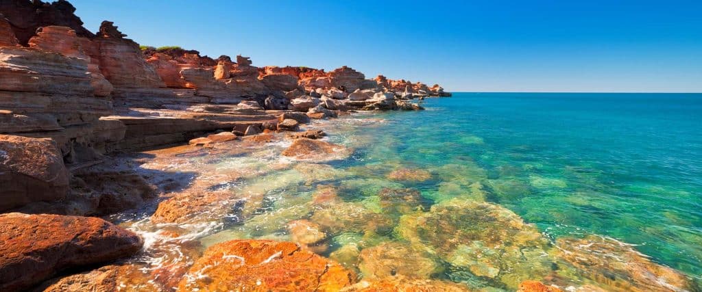 Red cliffs at Gantheaume Point, Broome, Western Australia. Fly Private to Broome.